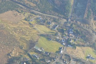 Close up aerial view of Kinlochewe at the SE end of Loch Maree, looking E.