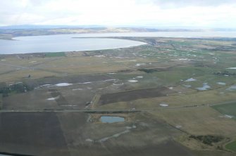General oblique aerial view over Inverness airport and the Moray Firth, looking N.