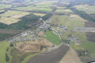 General oblique aerial view of Croy and surroundings, E of Inverness, looking SW.