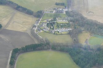 Oblique aerial view of Aberlour walled garden & campsite, Moray, looking S.