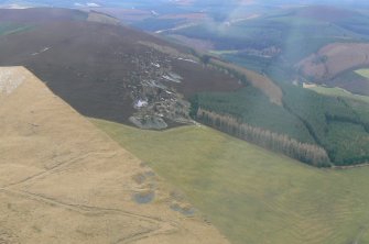 Oblique aerial view of Kirkney Quarries, Glens of Foudland, Aberdeenshire, looking SW.