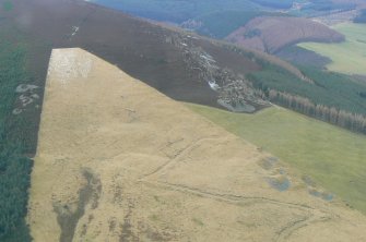 Oblique aerial view of Kirkney Quarries, Glens of Foudland, Aberdeenshire, looking SW.