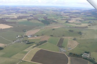 Oblique aerial view of Insch and the valley of The Shevock, Aberdeenshire, looking NE.