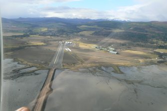 Aerial view of Ard Roy Causeway and Evanton Airfield, Cromarty Firth, looking W.