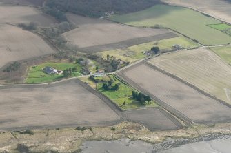 Aerial view of Urquhart Old Parish Church and burial ground, Cromarty Firth, looking S.