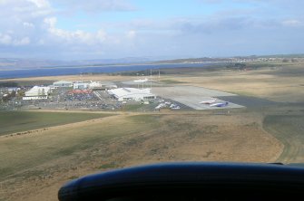 Aerial view of Inverness Dalcross airport, E of Inverness, looking north.