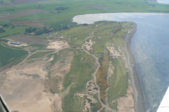 General oblique aerial view of Castle Stuart Golf Course under construction, E of Inverness, looking SW.
