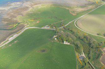 Distant oblique aerial view of Loch Fleet south shore and Skelbo Castle, East Sutherland, looking N.