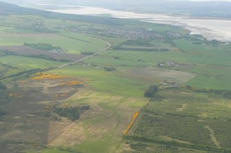 Oblique distant aerial view with Tain, Dornoch Firth and Bridge, looking NW.