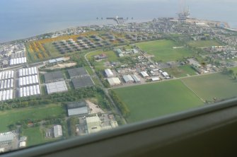 Oblique aerial view of Invergordon  with the Cromarty Firth, looking S.