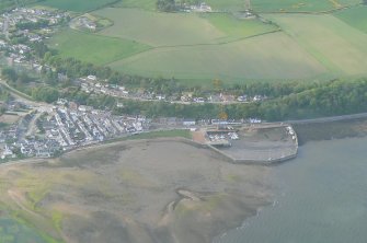A detailed close aerial view of the Black Isle village of Avoch, its harbour and houses, looking N.