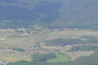 An oblique aerial view of Upper Rogie settlement, and Gleann Sgathaich, near Contin, Easter Ross, looking NW.
