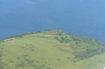 Oblique aerial view of the South Sutor, Cromarty, looking E.