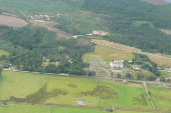 Oblique aerial view of the Sutherland Technical School, Golspie, East Sutherland, looking NW.