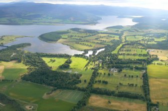 Oblique aerial view of Skibo Castle and Home Farm on the northern side of the Dornoch Firth, looking W.