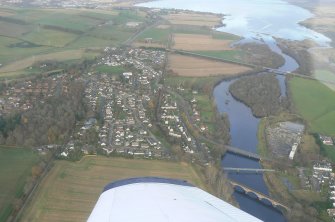 Oblique general aerial view of Maryburgh near Dingwall, Easter Ross, looking NE.
