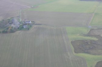 Oblique aerial view of Gilchrist Church and Mausoleum, near Muir of Ord, looking S.