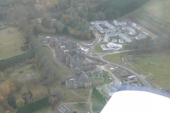 Oblique aerial view of Craig Dunain Hospital building, Inverness, looking W.