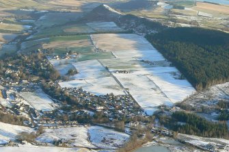Aerial view of Strathpeffer and Knockfarrel Hill Fort, looking W.
