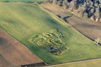 Oblique aerial view of East Mulchaich Township at Ferintosh on the Black Isle, Ross-shire, looking NE.