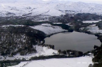 Aerial view of Loch Achilty and henge, Contin, Easter Ross, looking SW.