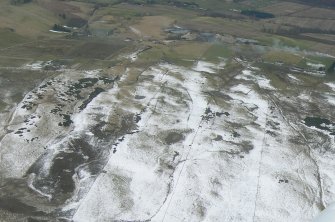 General oblique aerial view of improved croftlands above Heights of Docharty and Heights of Brae near Dingwall, Ross-shire, looking SSE.