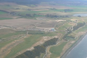 Oblique aerial view of Castle Stewart Golf Course, E of Inverness, looking S.