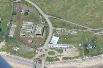 Aerial view of Nigg WW2 Submarine Mine Depot and Magazine, Cromarty Firth, looking N.