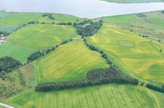 Aerial view of Tarradale House and surrounding fields under crop, Beauly Firth, looking SE.