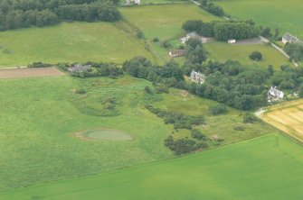 Aerial view of Mulchaich Wester Cairn and Township, Black Isle, looking WNW.