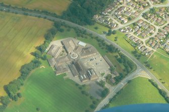 Aerial view of Culloden Academy, outskirts of Inverness, looking N.