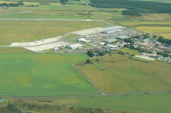 Aerial view of Dalcross Industrial estate and airport, E of Inverness, looking E.