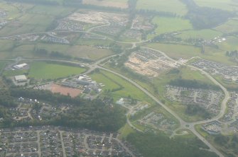 Aerial view of Lochardil and Inverness Royal Academy with  A8082, Inverness, looking SE.