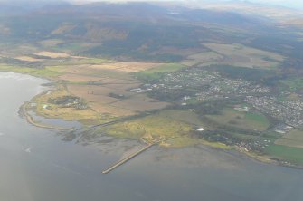 An oblique aerial view of Alness Point and Alness, Ross-shire, looking NE.