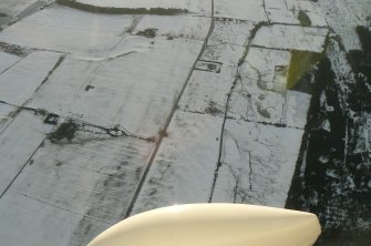 An oblique aerial view of Upper Radderty, Rosemarkie, Black Isle, looking SW.