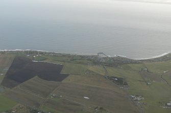 An oblique aerial view of Shandwick, Balintore and Hilton of Cadboll on the Tarbat Peninsula, looking SE.