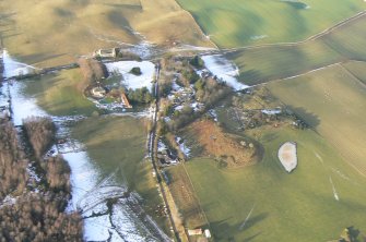 Aerial view of Mulchaich Chambered Cairn and settlement remains, Black Isle, looking SW.