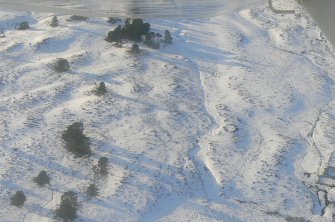 Aerial view of Strath Sgitheach sheepfold and hut circle settlement, near Dingwall, Easter Ross, looking NW.