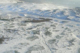Aerial view of Strath Sgitheach roundhouse settlement, near Dingwall, Easter Ross, looking SE.