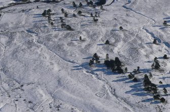 Aerial view of Strath Sgitheach, hut circle settlement and square enclosure, near Dingwall, Easter Ross, looking  S.