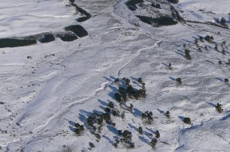 Aerial view of Strath Sgitheach hut circle settlement, square enclosure and sheepfold, near Dingwall, Easter Ross, looking E.