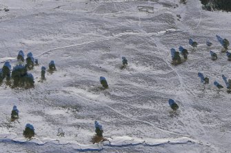 Aerial view of Strath Sgitheach hut circle settlement and later sheepfold, near Dingwall, Easter Ross, looking NE.