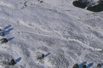 Aerial view of Strath Sgitheach hut circle settlement and later sheepfold, near Dingwall, Easter Ross, looking NE.