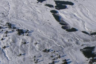 Aerial view of Strath Sgitheach hut circle settlement, sheepfold and enclosures, near Dingwall, Easter Ross, looking NNW.