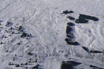 Aerial view of Strath Sgitheach hut circle settlement, sheepfold and enclosures, near Dingwall, Easter Ross, looking NW.