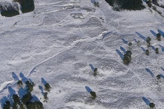 Aerial view of Strath Sgitheach hut circle settlement and later sheepfold, near Dingwall, Easter Ross, looking NNE.