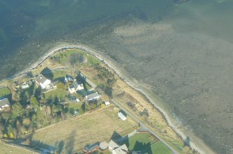Aerial view of Newhall Point fish trap and Udale Bay Crannog, Black Isle, looking NE.