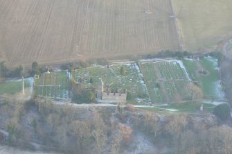 Aerial view of Gaelic Chapel, Graveyard and Wall, The Paye, Cromarty, looking SE.