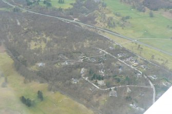 Aerial view of Kincraig, Spey Valley, and the A9, looking S.