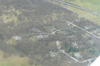 Aerial view of Kincraig, Spey Valley, and the A9, looking S.